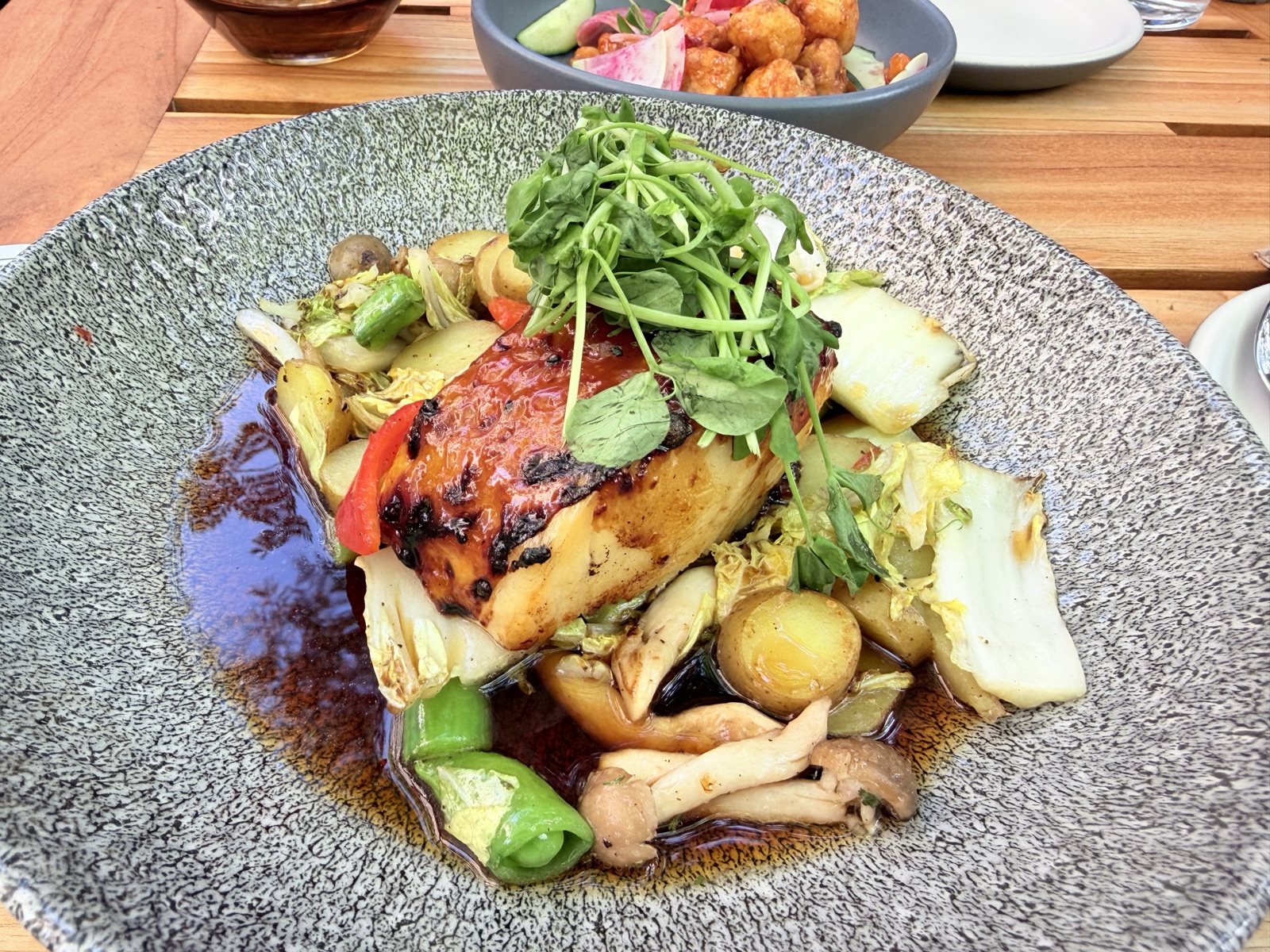 Original lunch photo of a seabass dish used as input
